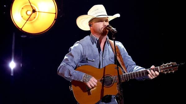 Cody Johnson takes batting practice, throws first pitch at Texas Rangers game